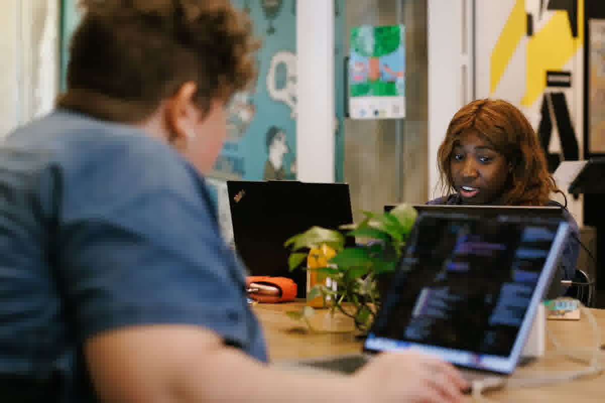 Members working side by side at Indy Hall